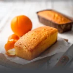 Cake de naranja artesanal, esponjoso y recién horneado en Panadería El Molino, Cali.