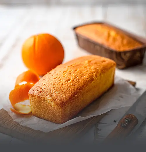 Cake de Naranja - Panadería El Molino Cali Cake de naranja artesanal, esponjoso y recién horneado en Panadería El Molino, Cali.